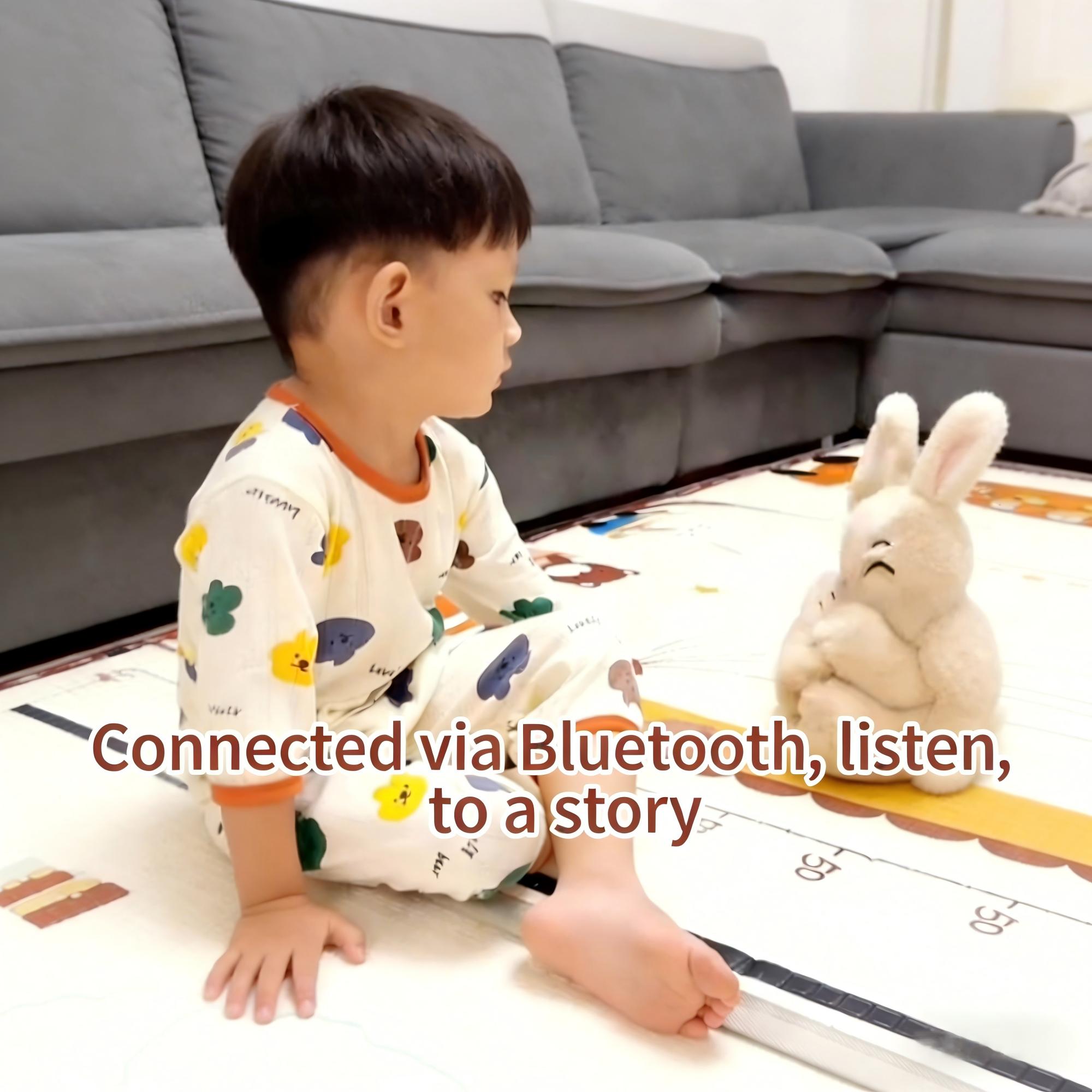 Baby listening to story via Bluetooth plush rabbit toy, interactive educational toys for toddlers